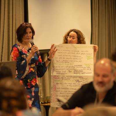 Fiona Lawton and Louise Healy presenting group activity feedback