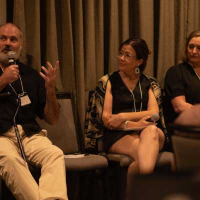 Panelists at the Showcase speaking