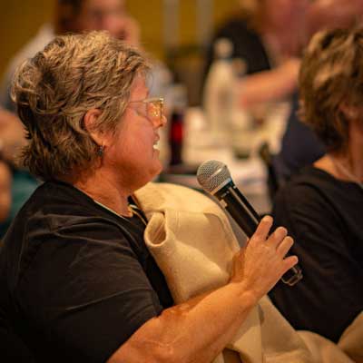 Attendee at the Showcase asking a question