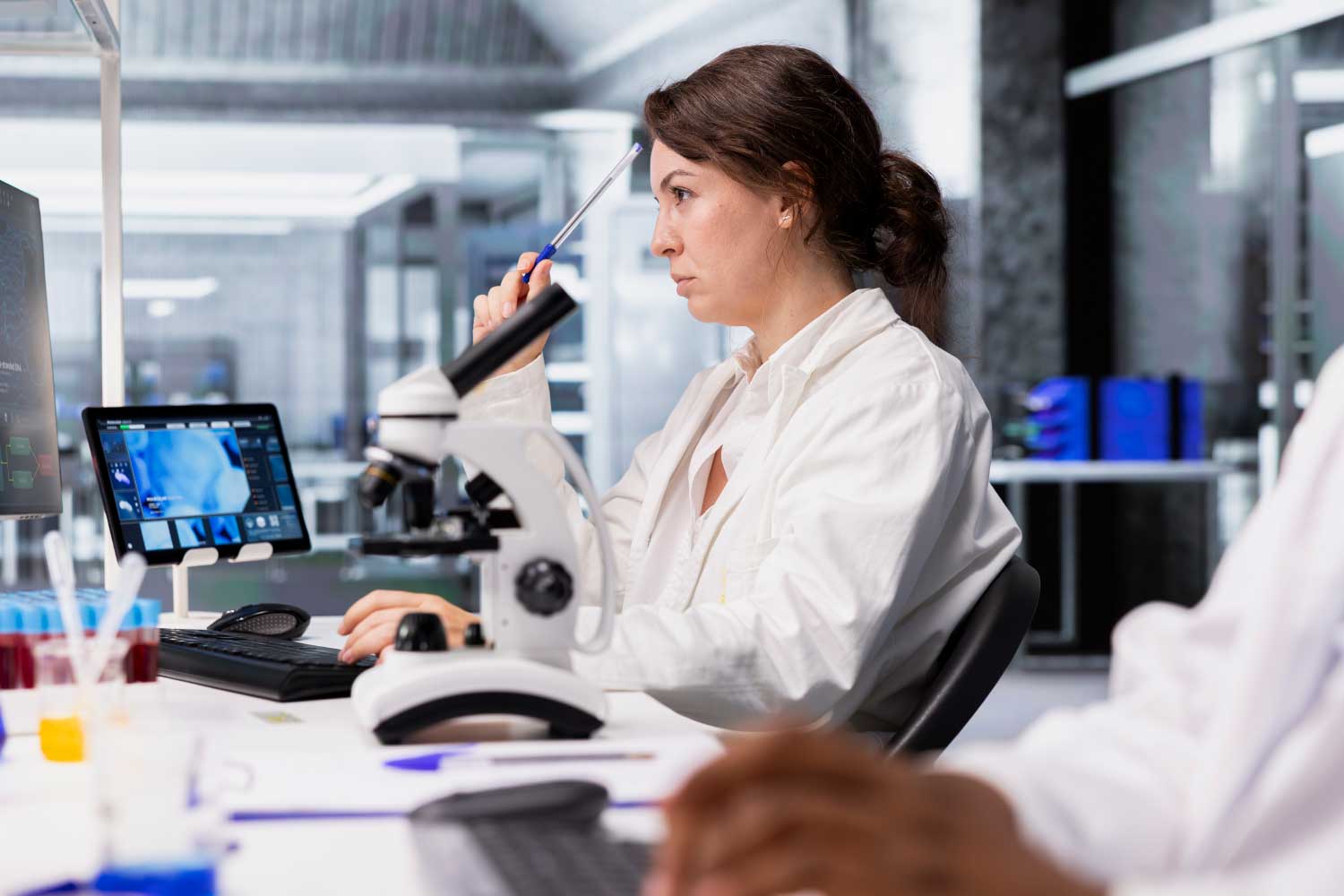A researcher in a laboratory setting.
